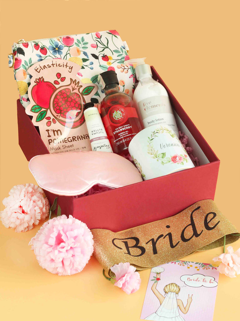 Angroos Fabulous wedding hampers for couples adorned with Photo frames,  macarons, and chocolates | Wedding gifts